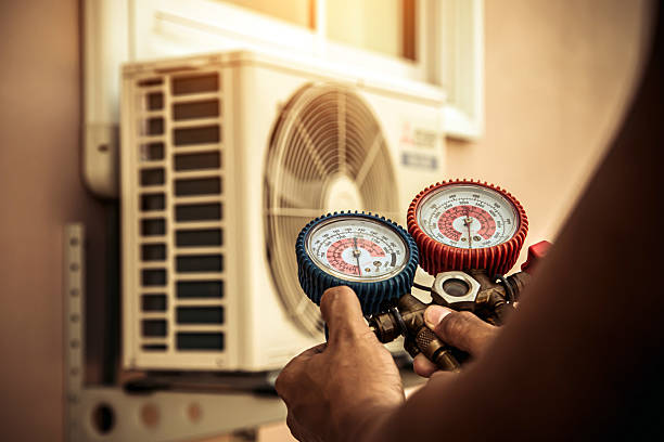Professional Air Conditioning Service technician working in Blackstone, VA